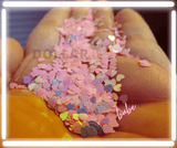 pink and blue opalescent glitter shaped hearts