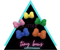 tiny puffy bows of clay for slime and crafts